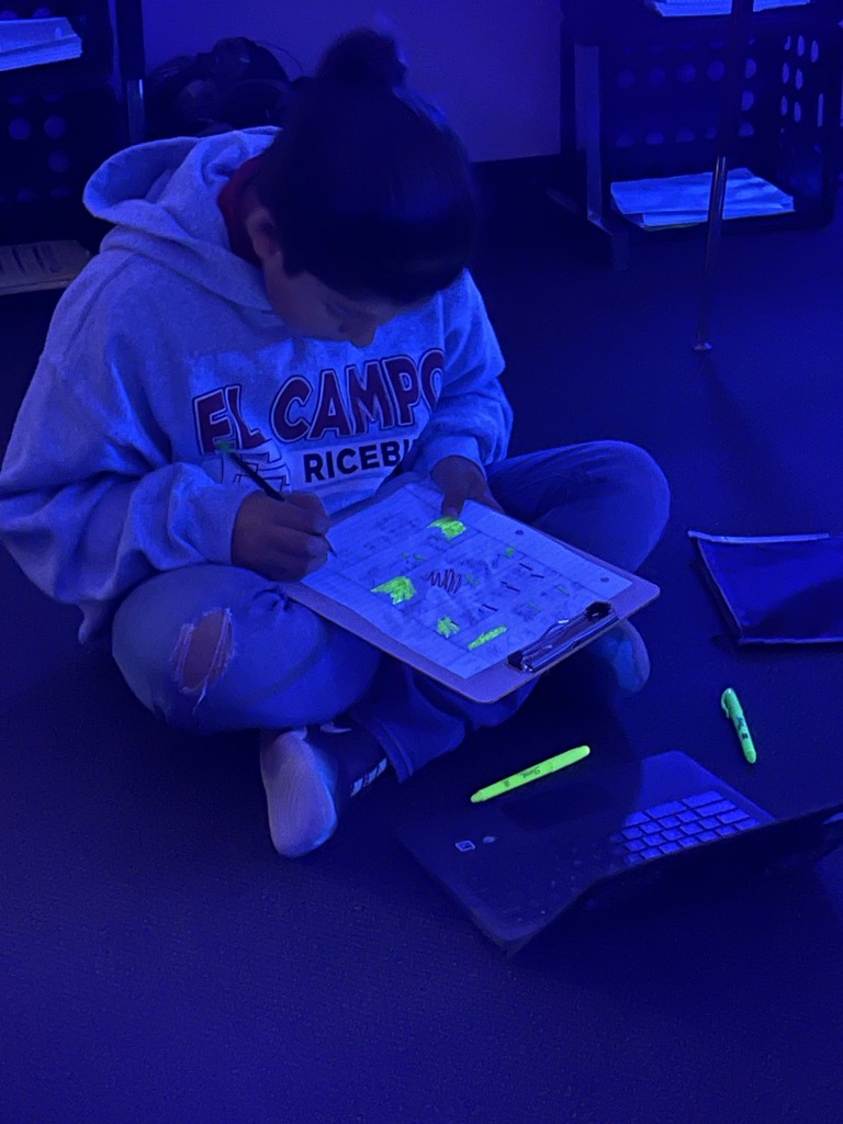 student working a problem in math class