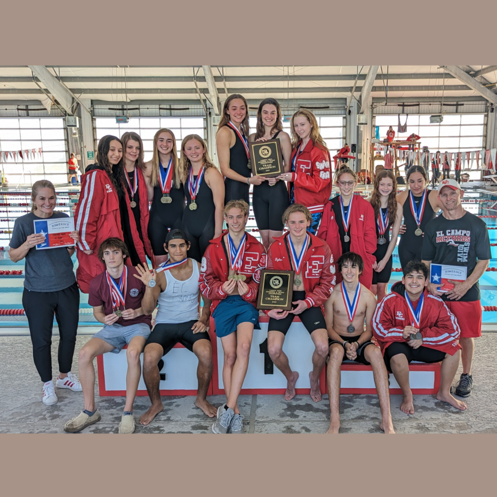 boy and girl swimmers with coaches displaying their medals and plaques as the district champs