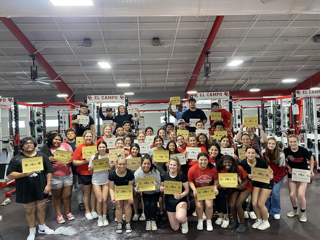 powerlifting team with their certificates