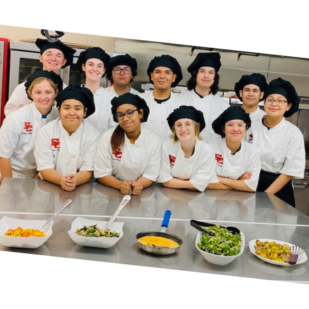 culinary students posing with their dishes